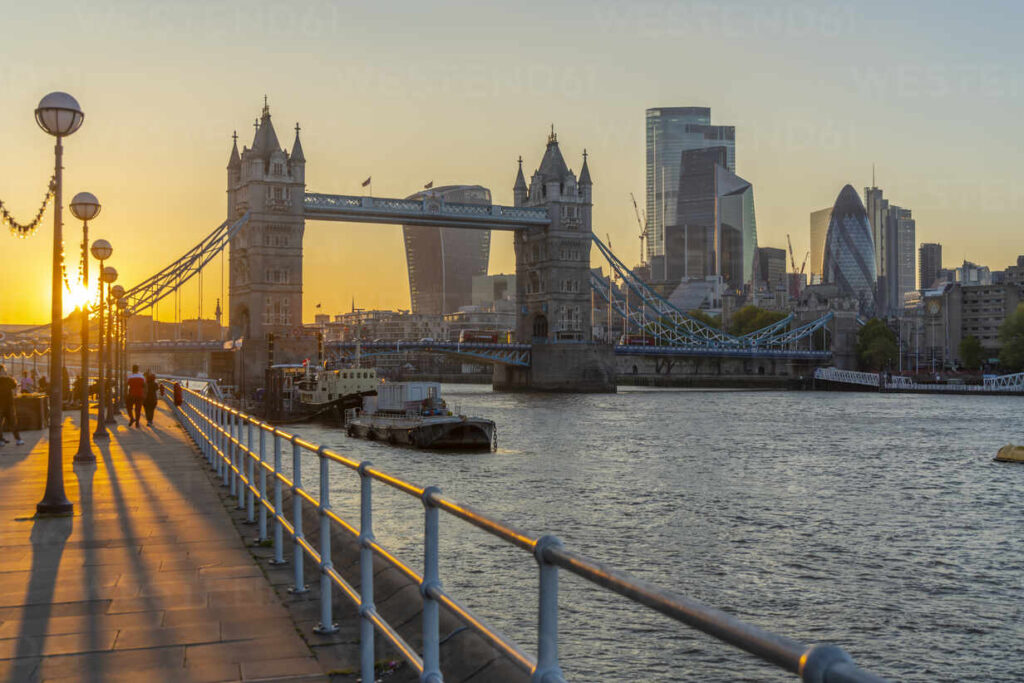 View of Tower Bridge and the City of London in the background at sunset, London, England, United Kingdom, Europe